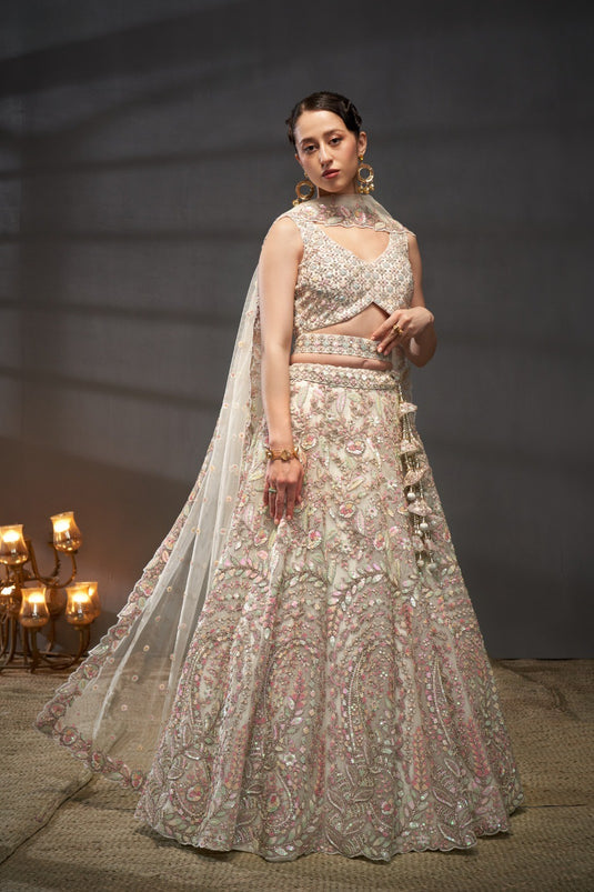 Cream Net Multicolor Sequins Embroidered Semi Stitched Bridal Lehenga Choli
