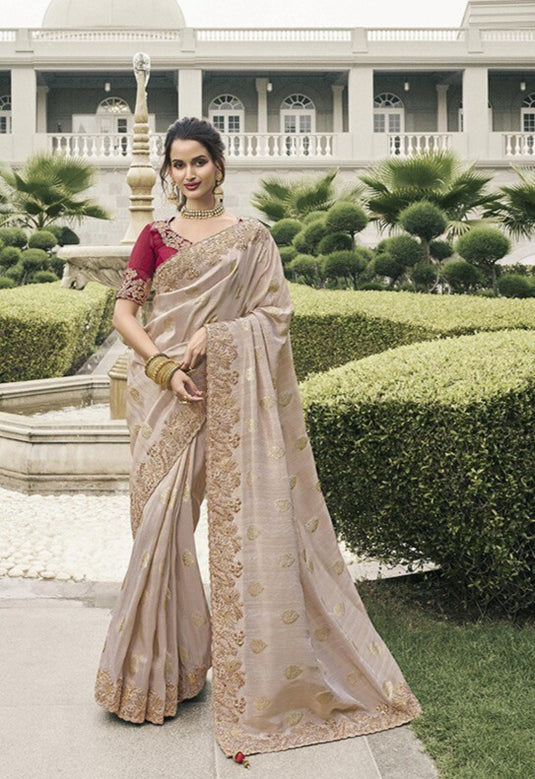 Beige Tissue Silk Stone Pearl Embroidered Mirror Work Festive wear Saree