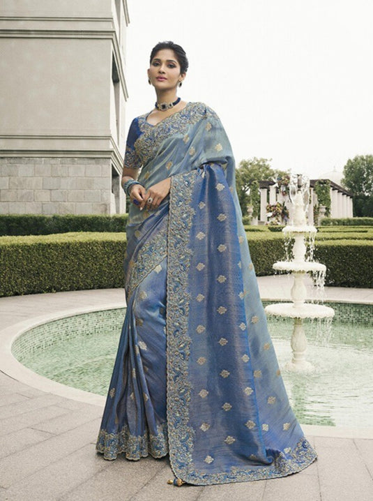 Beige Tissue Silk Stone Pearl Embroidered Mirror Work Festive wear Saree