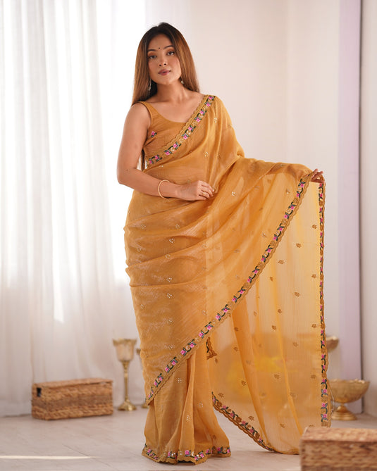 Mustard Floral Embroidered Tissue Fesive Wear Saree For Women