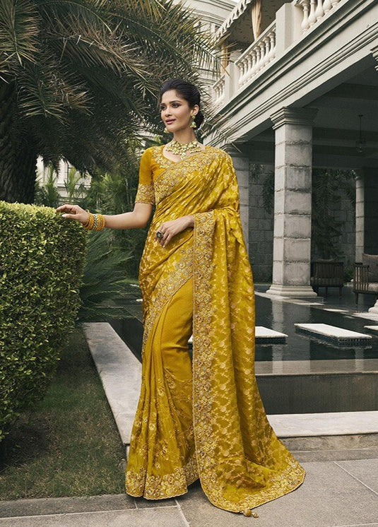 Beige Tissue Silk Stone Pearl Embroidered Mirror Work Festive wear Saree