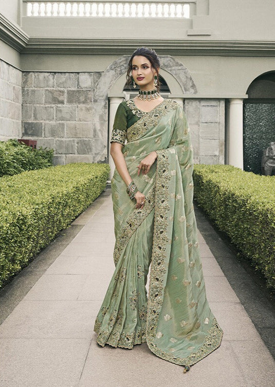 Beige Tissue Silk Stone Pearl Embroidered Mirror Work Festive wear Saree