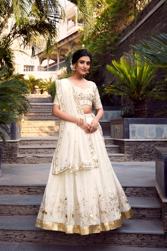 Off White Sequins Embroidered Silver Glossy Semi Stitched Bridal Lehenga Choli