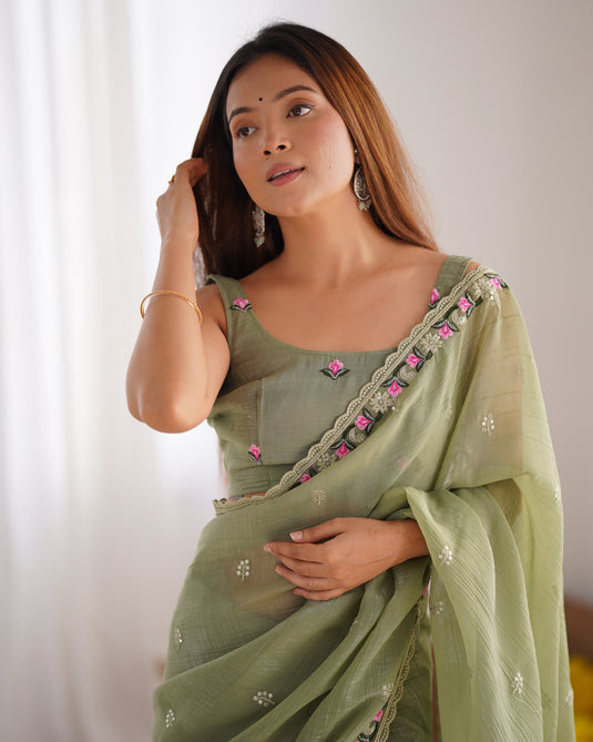 Mustard Floral Embroidered Tissue Fesive Wear Saree For Women