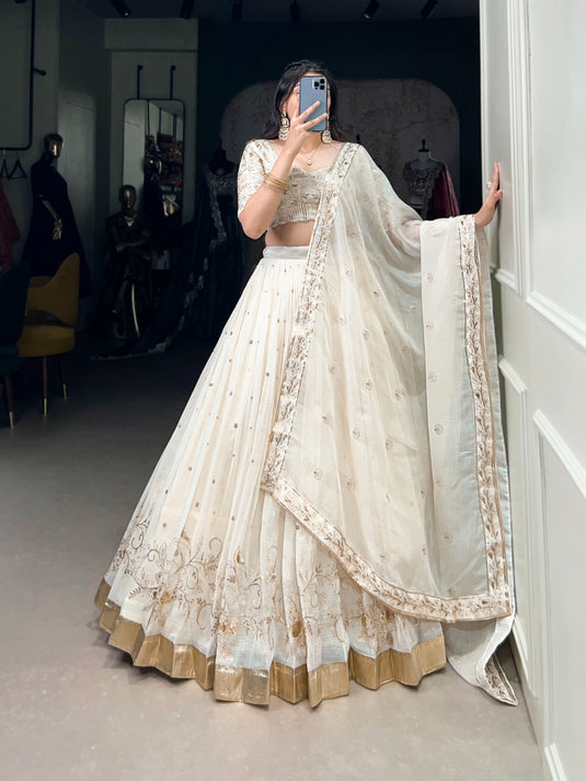 Navratri Special White Embroidered Silver Glossy Semi Stitched Lehenga Choli For Women