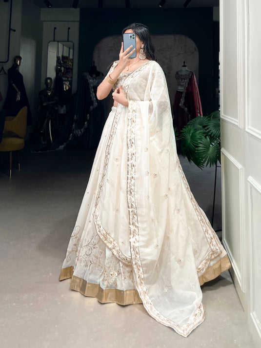 Navratri Special White Embroidered Silver Glossy Semi Stitched Lehenga Choli For Women
