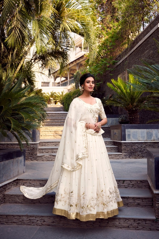 Off White Sequins Embroidered Silver Glossy Semi Stitched Bridal Lehenga Choli