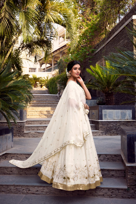 Off White Sequins Embroidered Silver Glossy Semi Stitched Bridal Lehenga Choli